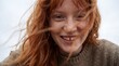 © Zireael - Cinematic low angle closeup portrait of a smiling redhead in a knitted sweater for emotive banner and wallpaper design