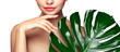 © Oleg Gekman - Close up woman face with green exotic leaf. Skin care beauty treatments concept. Model with clean, health skin of face. Monstera Leaves