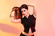 © New Africa - Young hip-hop dancer in stylish clothes posing on color background