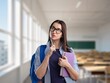 © BillionPhotos.com - Happy young student in class room