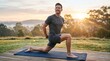 © Juliana - Man stretching on yoga mat outdoors at sunrise healthy lifestyle