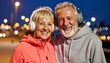 © photostockatinat - A happy senior couple wearing headphones and sportswear, enjoying an outdoor evening stroll and listening to music, exuding joy and vitality