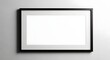 © MSTSARMIN - Mockup of a black picture frame on a wall with a white background