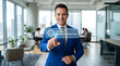 © Taniya - Businessman in blue suit, digital transformation concept, office background, modern workspace
