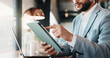 © peopleimages.com - Laptop, tablet and hands of businessman in office with email for finance report on revenue growth. Digital technology, computer and male financial manager with online feedback for investment risk.