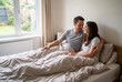 © Vieriu - Love between partners in bed. Family in the bedroom