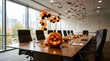 © OYEs RH - Festive office conference room decorated for halloween with pumpkin centerpiece balloons and bat decorations for a team meeting