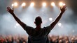 © AZ Studio - Concert performer with arms raised in celebration to an adoring crowd