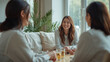 © bephoto - カフェのような部屋で日本人女性たちが楽しく語り合う生活写真