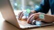© kaya - Close-up of hands typing on a laptop keyboard, surrounded by glowing digital e-commerce icons, symbolizing a seamless and secure online shopping experience