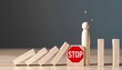 © Rat Art - Wooden arrow blocks changing direction beside a stop symbol representing obstacles and strategic decisions.