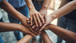 © aylona - Hands stacked together in unity emphasizing natural beauty and tranquility