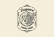 © Muhamad - Elegant Retro art house logo monochrom with a graceful swan in an ornate vintage frame, ideal for luxury goods branding