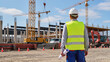 © Jakub - Construction Site Overview​Engineer Inspecting Progress​Building Infrastructure Development​Project Manager with Blueprints​Heavy Machinery at Work​Structural Engineering Inspection​Safety First