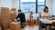 © Aurora Aesthetics - Brooklyn apartment moving boxes family relocation city home quiet transition quiet moment emphasizes uncertainty hope and the personal side of changing homes small city apartment filled with labeled