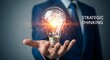 © AI Image Studio - Man's hand holding light bulb with brain gears inside