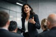 © Rawpixel.com - Confident businesswoman leading presentation.