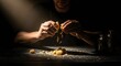 © Alan - Mans Hands Breaking Apart Food on a Dark Table.