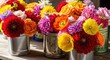 © putri - Numerous vividly colored blossoms are arranged in rustic metal containers on a weathered surface