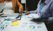 © Sutthicha - Auditor and accountant team working in office, analyze financial data and accounting record with calculator. Accounting company provide finance and taxation planning for profitable cash flow. Insight