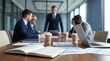 © Kep - close up office meeting scene with blurred business people in background