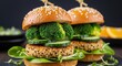 © Farah - Two healthy vegetarian quinoa burgers stacked with fresh broccoli, cucumber slices, lettuce, and sprouts on sesame seed buns