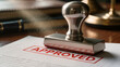 © Cassia - Red approved stamp on a business document, concept of acknowledgement and law.