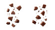 © stockmo - Broken chocolate pieces and crumbs dynamically scattered and floating in air, isolated on a transparent background, showcasing rich brown confectionery