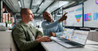 © Andrey Popov - Two Financial Analysts Are Looking At Dashboards