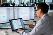© Andrey Popov - Office Manager Uses Computer Software To Organize Business Files