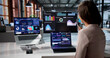 © Andrey Popov - Confident Financial Analyst Reviewing Important KPI Data