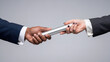© Harry - Business people passing a silver relay baton representing teamwork and corporate project handover