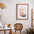 © FollowTheFlow - Minimalist Home Interior Design with Abstract Art, Rattan Furniture, and Table Setting with Teapot and Teacup