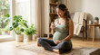 © INT888 - Pregnant woman drinking water maternity hydration home sitting yoga mat wellness healthy lifestyle indoor portrait, serene mother to be relaxing floor with glass of water bright living room with