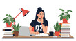 © Saulius - Focused young woman sitting at her desk studying with a laptop piles of books potted plants and a red lamp in a cozy home office.