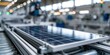 © gunzexx png and bg - A sleek solar panel rests on a production line, highlighting advancements in renewable energy technology and the shift towards sustainable power solutions in modern society.