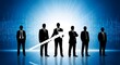 © NUR - Silhouettes of businessmen in suits holding a white arrow against a blue binary code background