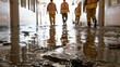 © Farin - Workers Walking Through Flooded School Hallway with Debris in Washington