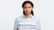 © Chandlerlikes - Overworked businesswoman receiving more paperwork while holding existing pile, frustrated office concept, white background