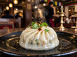 © Farith - Steaming Large Jombo Momo Dumpling on Plate in Restaurant