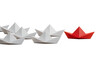 © feng - Different business concept.new ideas. paper art style. creative idea.Leadership concept, red leader boat leading white boats.Supports PNG files with transparent backgrounds.