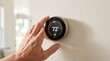 © Omishu Makes - Smart home thermostat adjusting temperature on wall energy efficient heating and cooling system