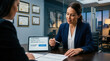 © SEPTI - Businesswoman Explaining Claim Documents To A Client In An Office Environment