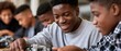 © gunzexx png and bg - A group of enthusiastic teenagers collaborating on a robotics project, exemplifying teamwork, innovation, and creativity in technology and engineering.