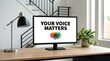 © Wajahat - Computer monitor displays 'your voice matters' message on desk with lamp and plant