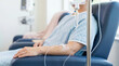 © Xenia - Close up of an IV drip chamber in a hospital. Patient receiving intravenous chemotherapy medication in an oncology infusion clinic. Medical treatment concept