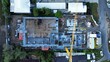© GoAerials - Top Down Aerial View of Active Urban Construction Site and Tower Crane Development