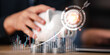 © chaylek - Investment analyst monitoring financial growth and wealth strategy through digital market analytics to improve profit performance, asset management, business expansion, and long term returns.