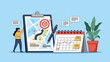 © Orni - Professional woman organizing tasks with large target, project map, and desktop calendar for efficient time management and goal setting.