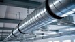 © Stock by Anika - Industrial metallic ventilation ducts in a modern building ceiling